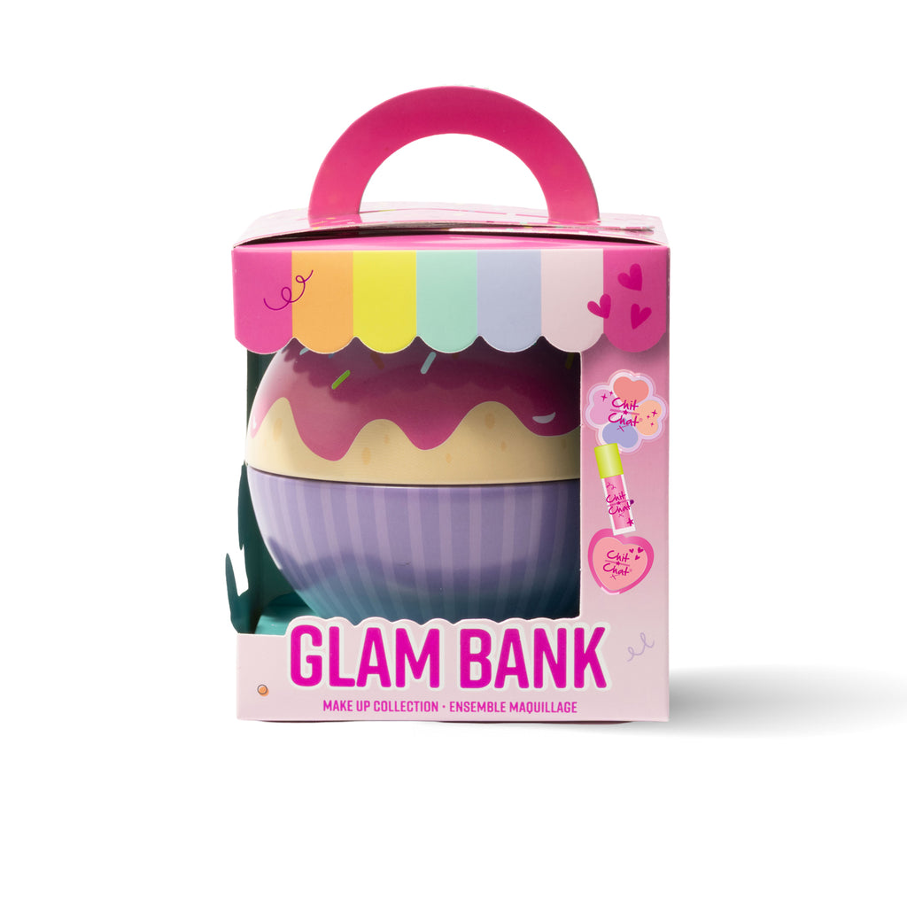 Glam Bank makeup collection set in a cupcake themed and shaped tin, packaged in a pink box with a cut out window to visualise the product.