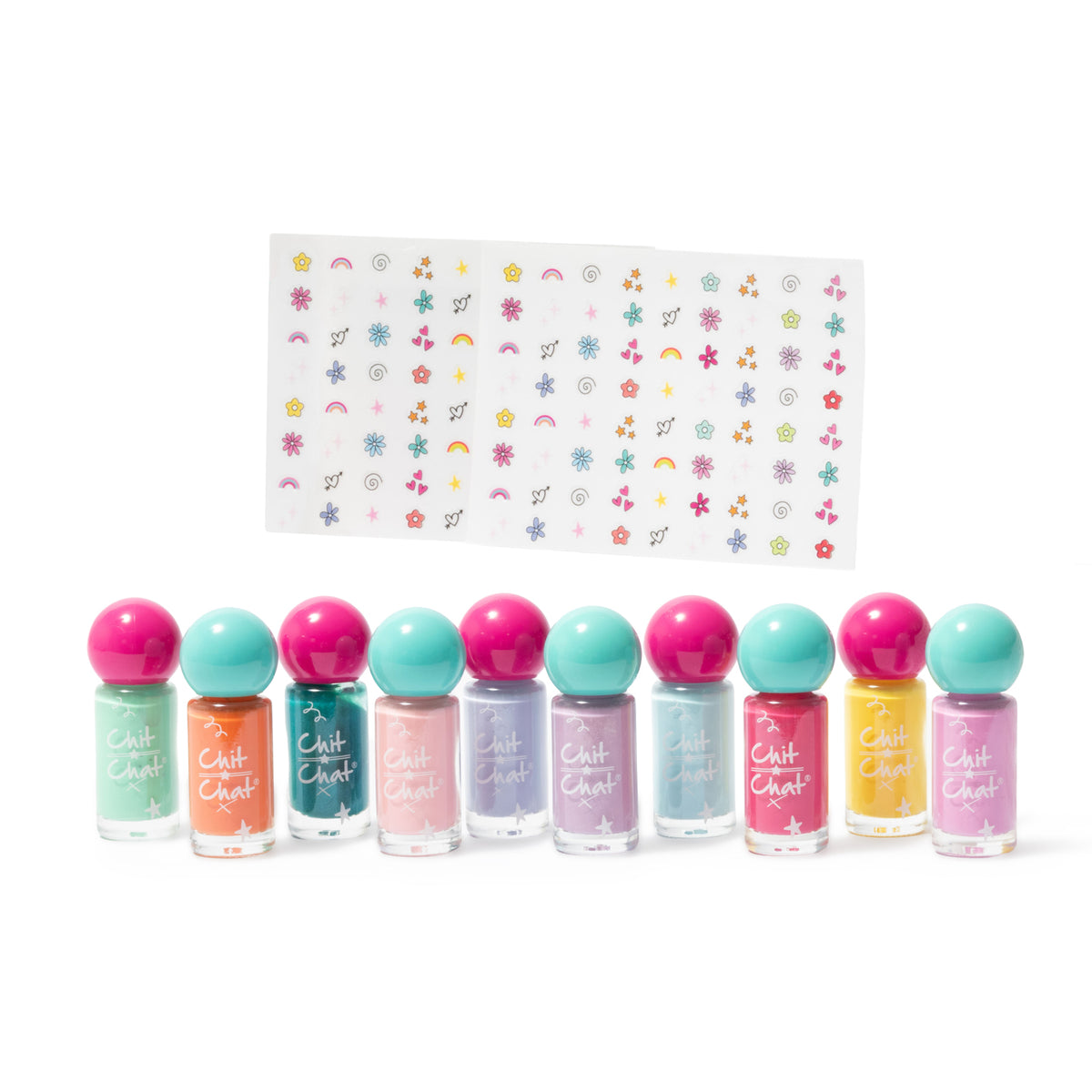 A set of ten nail polish bottles in assorted pastel and bright colours, arranged in a row below a white sheet featuring colourful star, flower, and rainbow, heart nail art stickers. The bottles have colourful spherical caps in pink and teal and the brand name 'Chit Chat' is visible on the bottles.