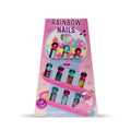 A pink retail display box for a nail colour collection labelled 'RAINBOW NAILS' with multiple small nail polish bottles arranged in tiers. Nail stickers placed at the top shown through a window cut out. The packaging is predominantly pink with a bubble gum machine graphic and flamingo character. The bottles show assorted nail polish colours.