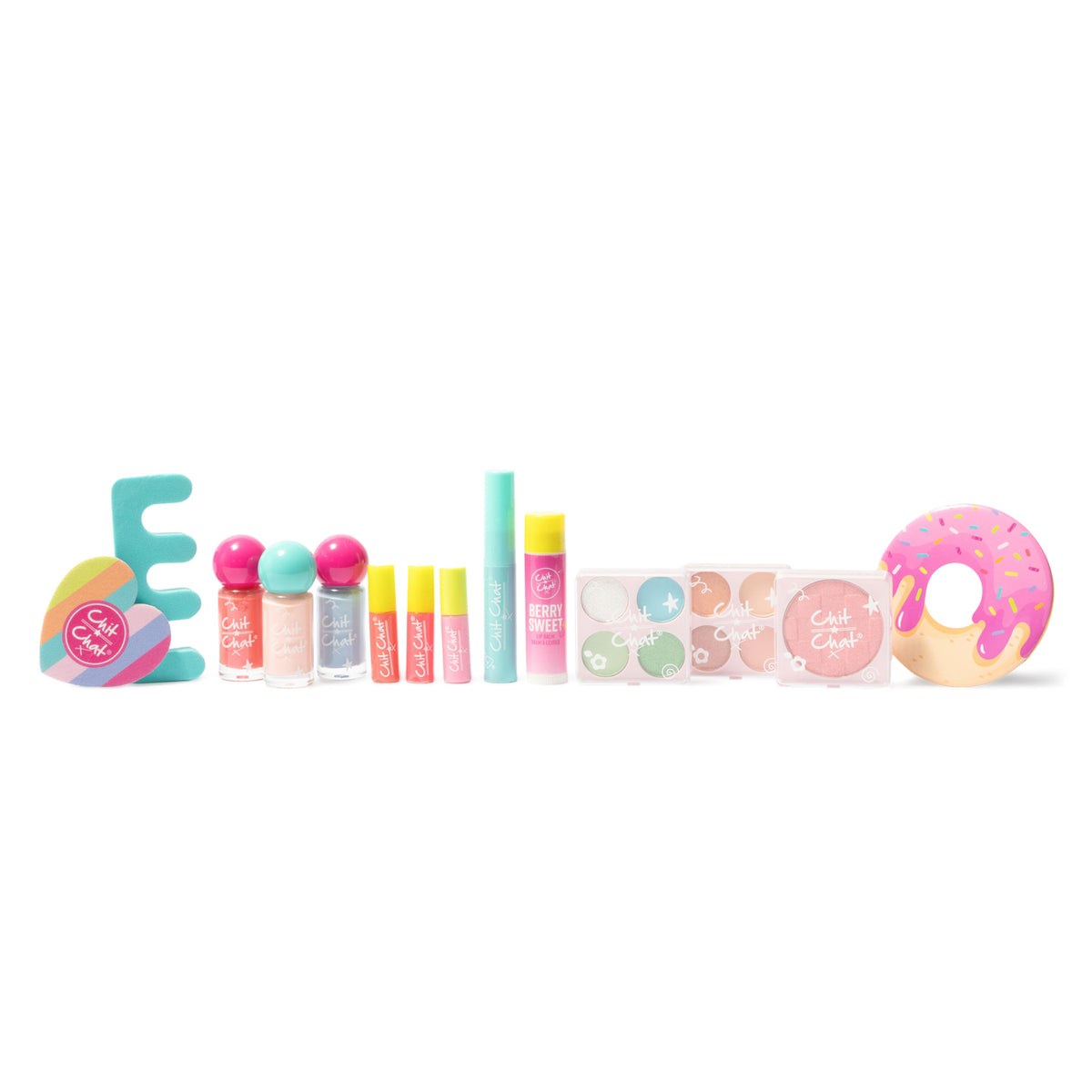 A line up of cosmetics on a white background. 3 x Lip-glosses with yellow lids, 1 x Lip Balm tube with a yellow lid, 1 x Mascara in a blue casing, 3 x Water-based Nail Varnishes with sphere lids, 1 x Turquoise Toe Separator, 1 x Donut Design Nail File, 1 x heart shaped Mirror,
2 x 4 Colour Eyeshadow Palettes,
1 x Blusher.