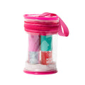 A clear cylindrical zippered cosmetic pouch with a bright pink zipper and pink carrying strap, containing four lip oils with different coloured bright lids.